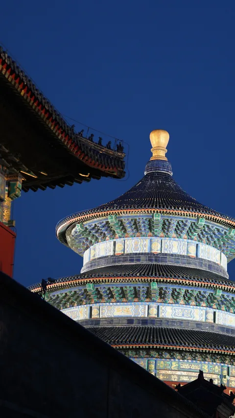 The Temple of Heaven illuminated against the night sky