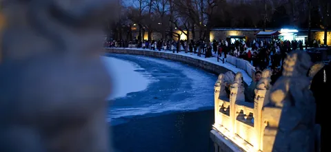 A lakeside balustrade at blue hour
