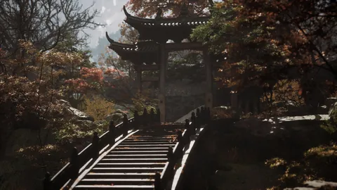 A temple gate surrounded by autumn trees