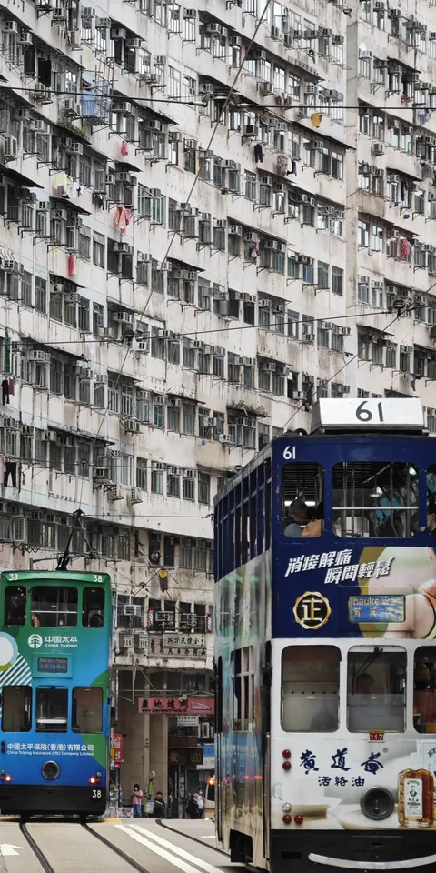 Trams beneath an apartment building