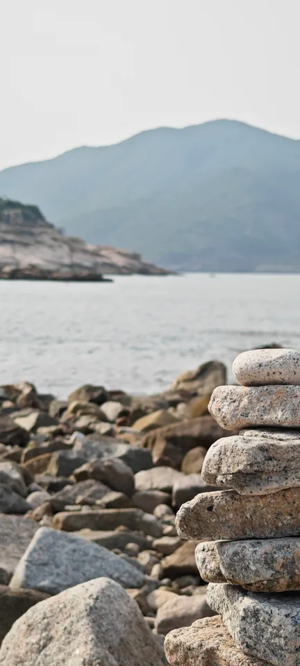Boulders beside a quiet bay