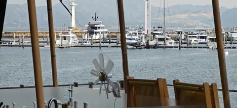 A marina seen through a waterfront terrace