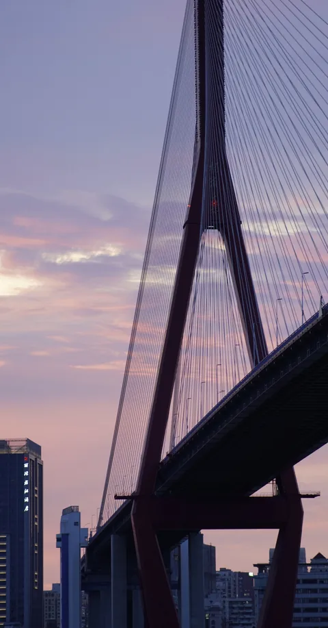 A cable-stayed bridge at dusk
